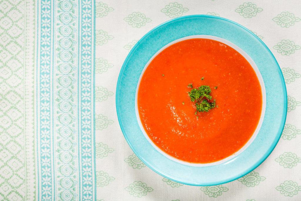 Homemade tomato and red pepper gazpacho soup.