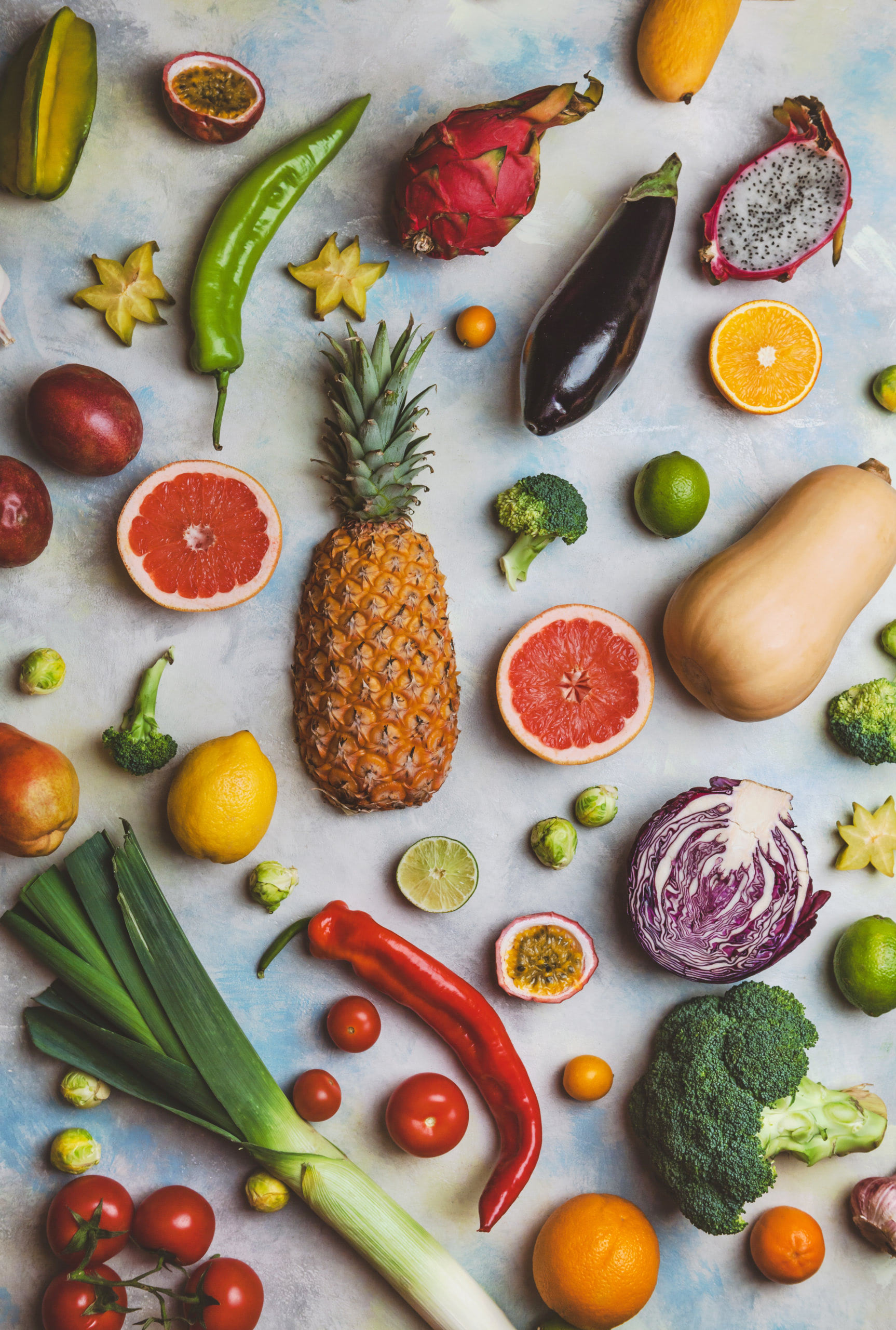 top view of different fruits and vegetables on marble table